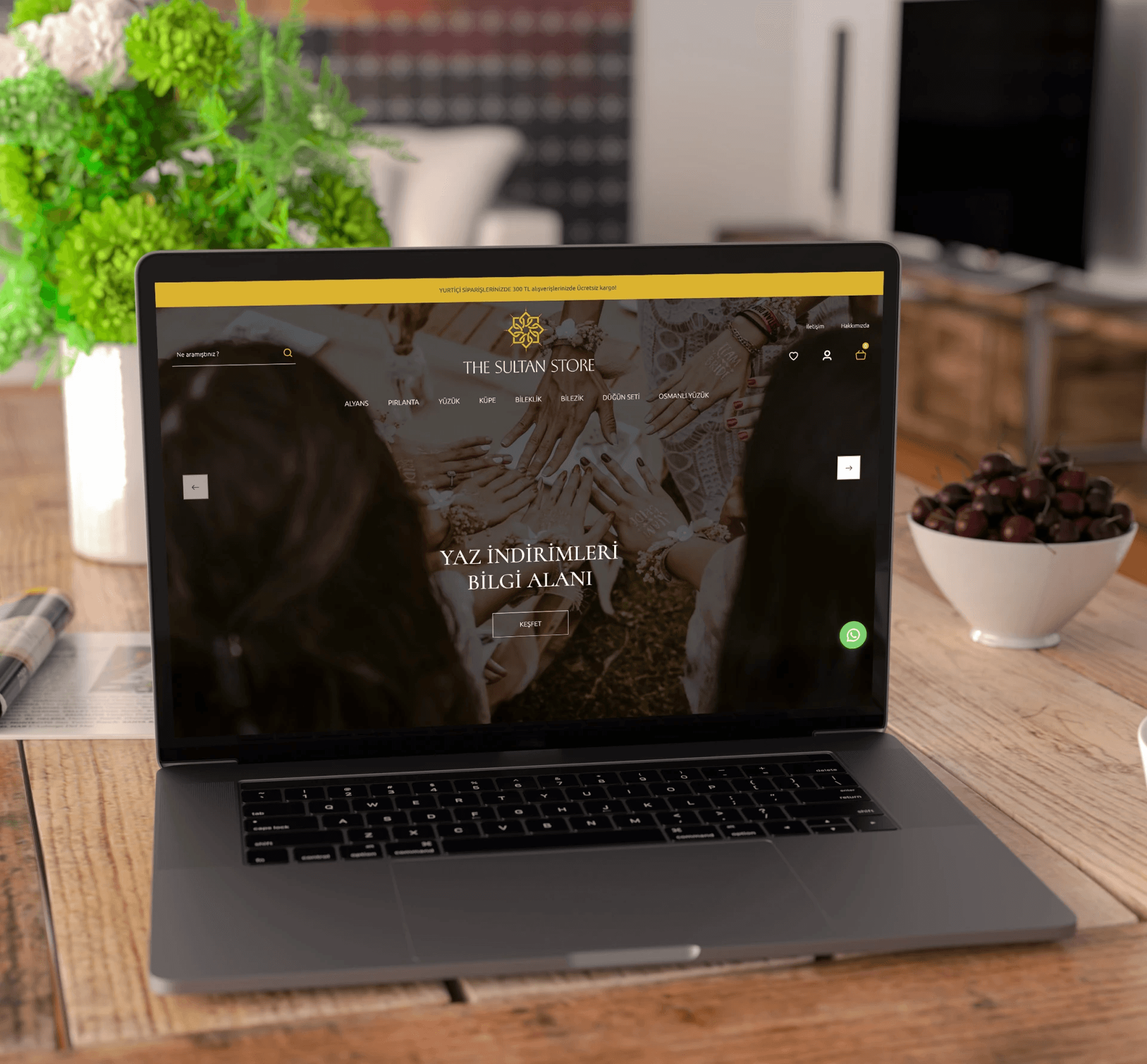 The Sultan Store website on a laptop: a full-bleed lifestyle photo and gold accents.